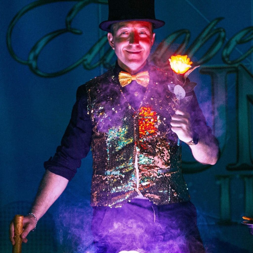 Artist making a bubble trick with lightened rose